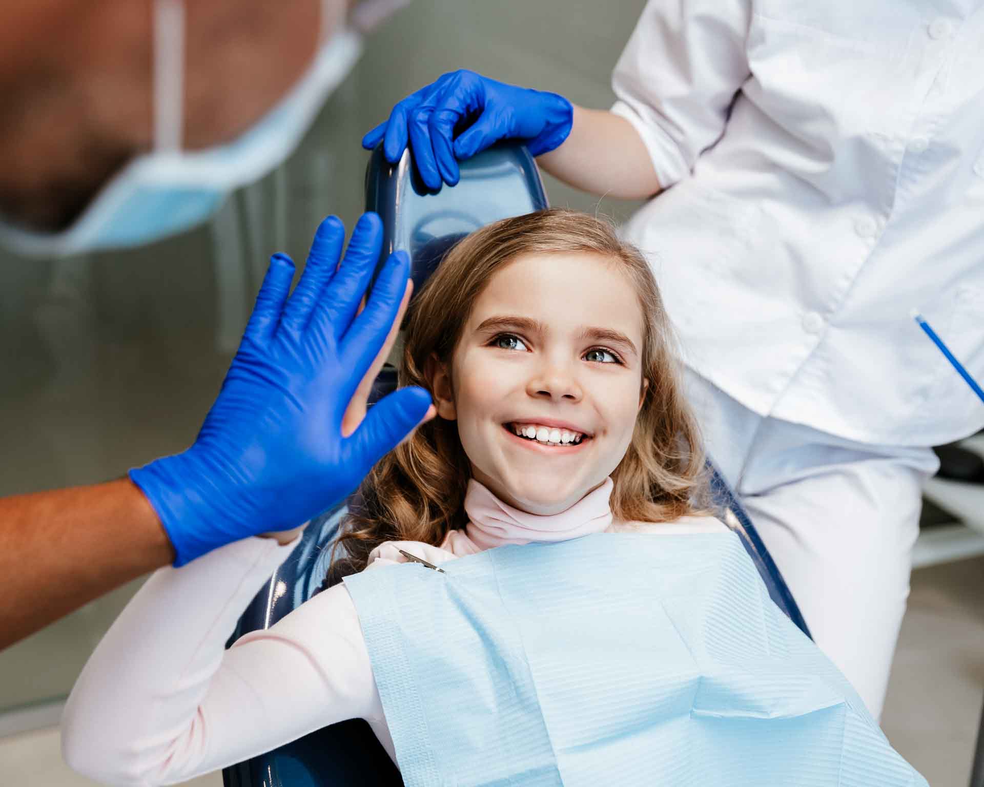 Child receiving friendly dental care at Grand Blanc Dental Center in Grand Blanc, Michigan